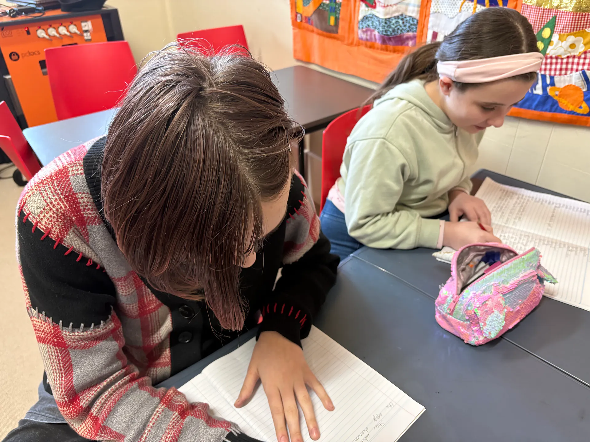 Students working together at a classroom table